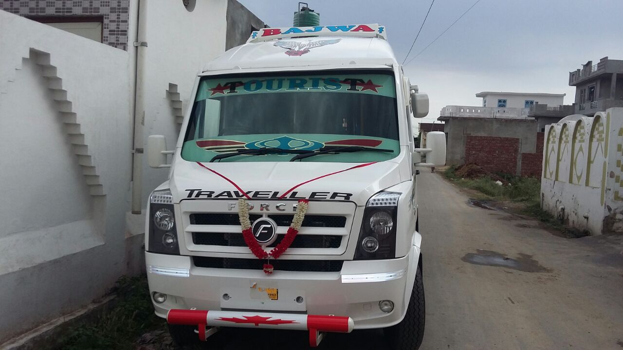 9 seater Tempo Traveller in Chandigarh